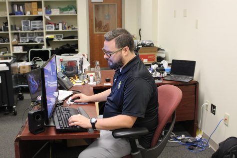 The technology director, Jesse Cresswell, hard at work.