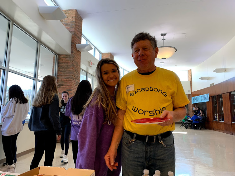 Kate+Latkovic+shares+a+smile+with+a+special+Olympian+during+their+lunch+break+at+the+Special+Olympics+event+at+Hutchison+School.+